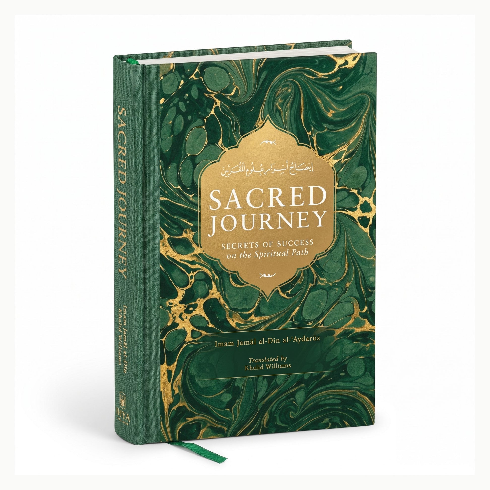 Sacred Journey hardcover shown at an angle, showing the green cloth spine with gold foil title, the marbled front board and the green ribbon marker